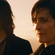 Neo and Trinity looking off into the sunset at the end of Matrix Resurrections.